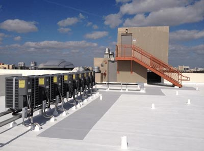 Image of a white roof on top of a commercial building