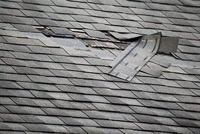 Damaged roof in need of repair
