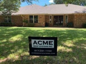 Street View Of An Acme Roof Yard Sign In Front Of A Home With A New Roof