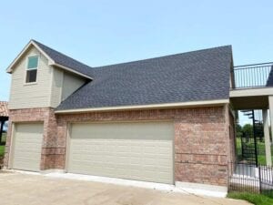 Street View Of A Beautiful Home With A New Roof