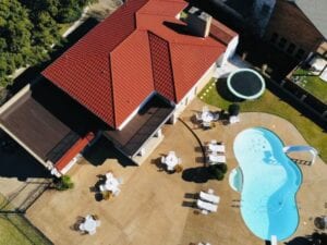 Drone view of read clay tile roofing