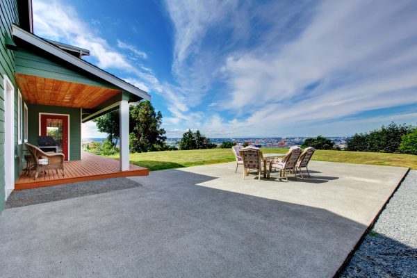 A picture of a patio cover on a house.