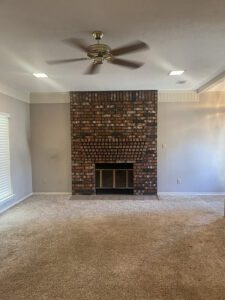 a fireplace made of red brick